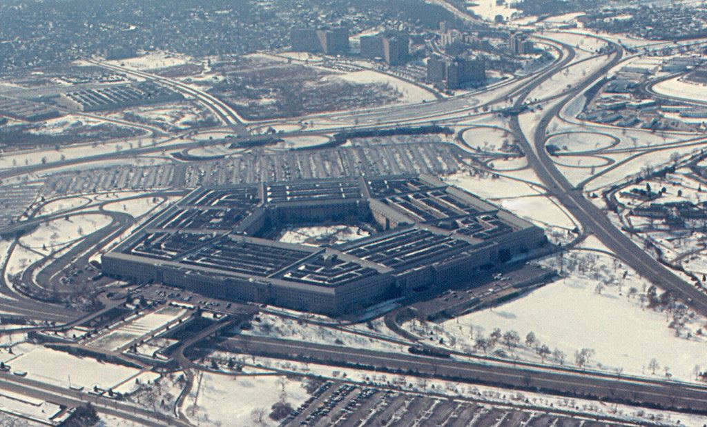 Aerial view of the Pentagon surrounded by snow-covered grounds, parking lots and highway interchanges